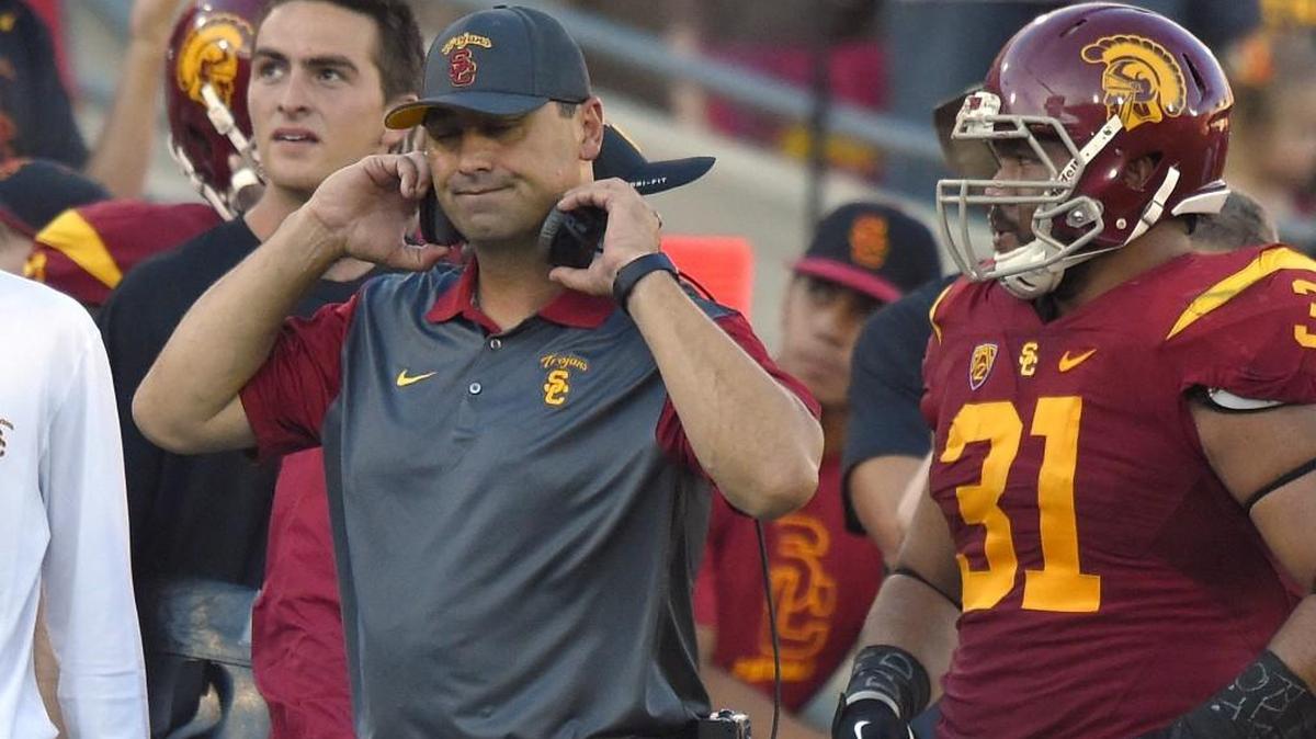 
Southern California coach Steve Sarkisian reacts to a penalty call as fullback Soma Vainuku watches during the first half of an NCAA college football game against Stanford, Saturday, Sept. 19, 2015, in Los Angeles. Stanford won 41-31.
