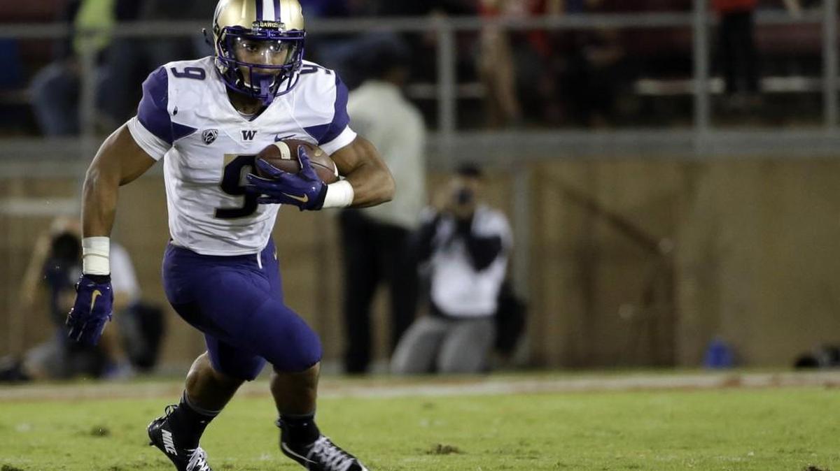 Myles Gaskin has 983 yards rushing this year — a UW record for a true freshman.