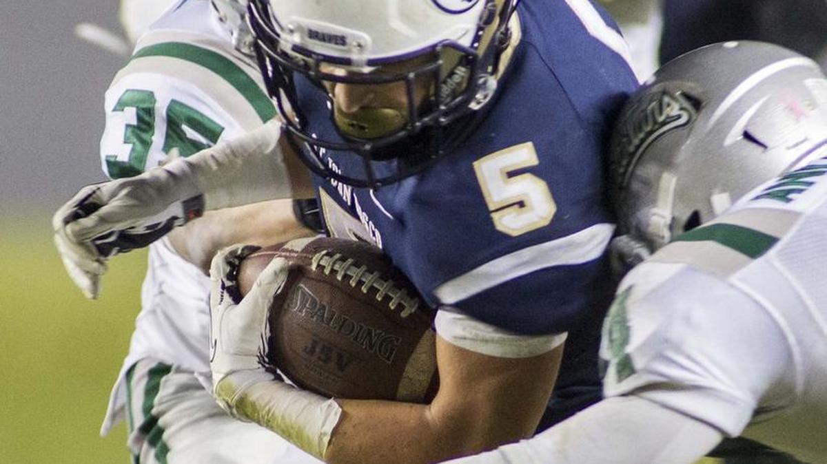 Sean McGrew (5), shown playing for St. John Bosco in 2013, is fighting for carries behind Myles Gaskin in the Huskies’ backfield.