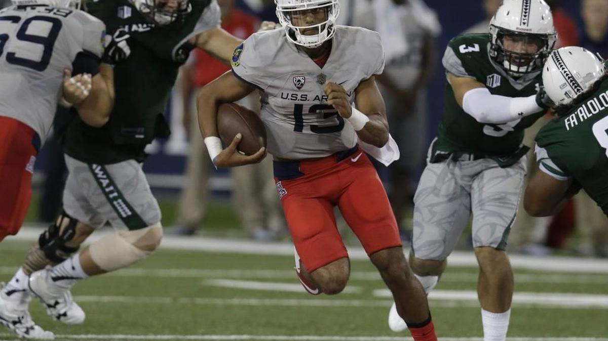 Arizona quarterback Brandon Dawkins (13) rushed for 118 yards and three touchdowns last week in a 47-28 victory over Hawaii. With starter Anu Solomon still questionable with a knee injury, Washington could see a lot of Dawkins on Saturday.