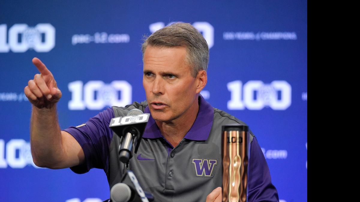 
Washington Huskies football coach Chris Petersen spoke at the Pac-12 media day Thursday in Burbank, Calif., about his team trying to find a starting quarterback. “We don't know (who is the starter). We really don't. I wish we did,” Petersen says.
