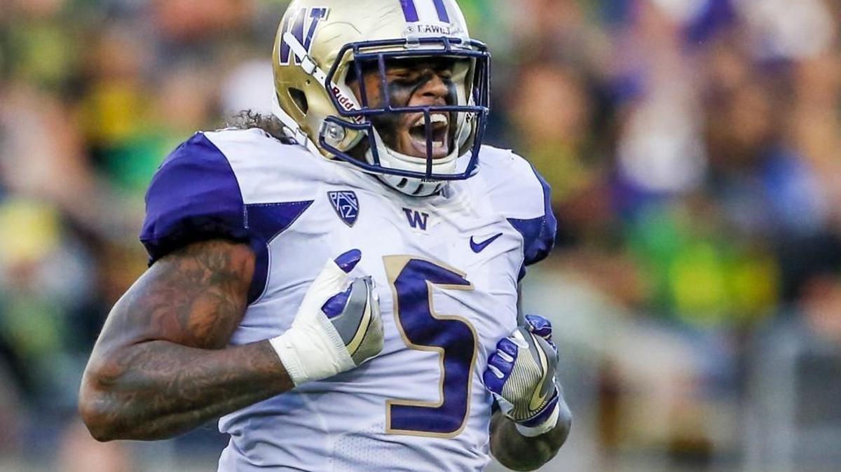 Washington linebacker Joe Mathis celebrates a sack in the second quarter. Mathis is out for the rest of the season with an injured foot.
