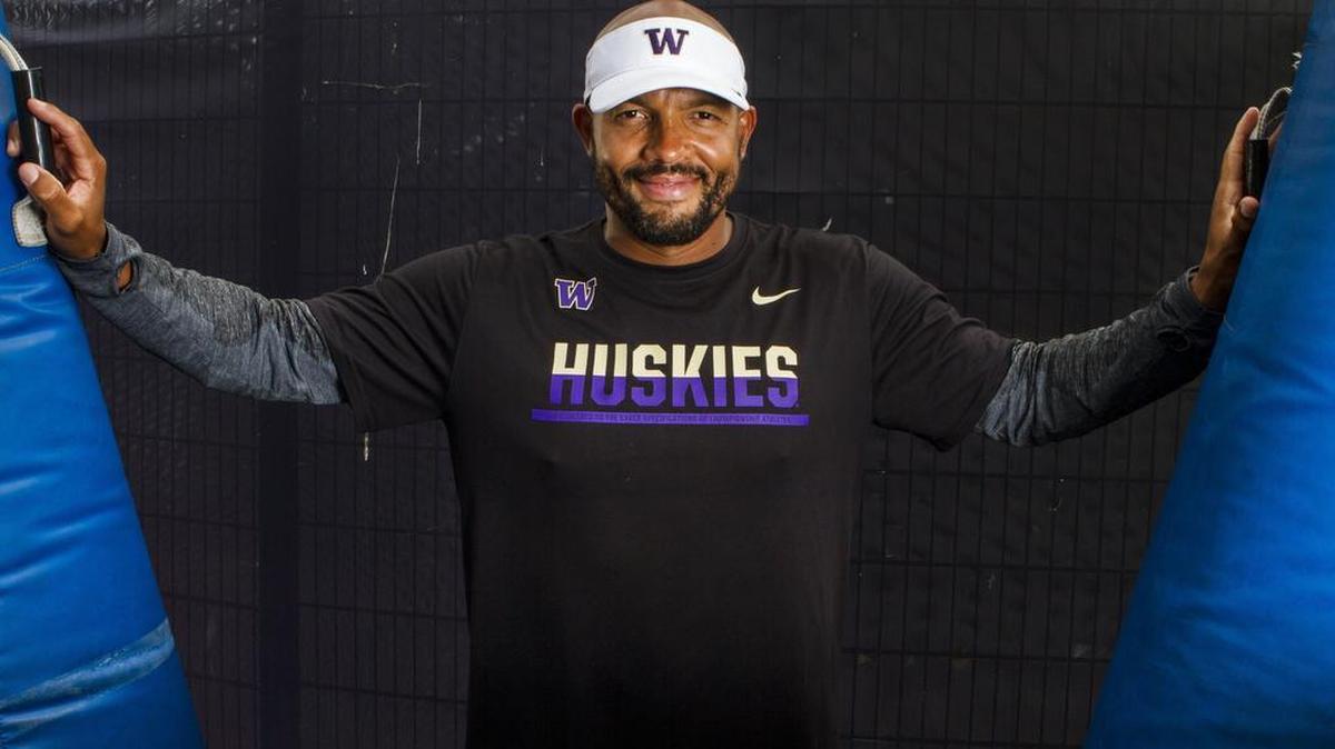 Jimmy Lake, University of Washington defensive backs coach, has been brought up various media outlets for vacant coaching opportunities, but Lake says he is happy at Washington and working for head coach Chris Petersen.