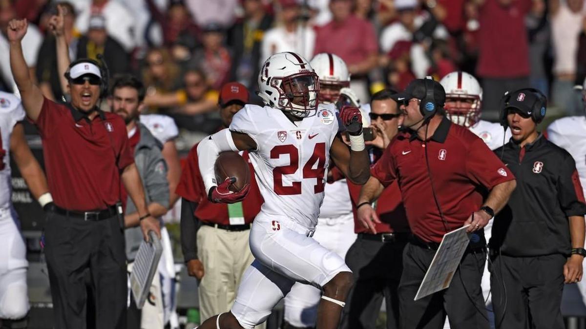 Stanford cornerback Quenton Meeks returns an interception 66 yards for a touchdown during the Cardinal’s victory over Iowa in the Rose Bowl on Jan. 1. Meeks and fellow starting cornerback Alijah Holder are likely to miss Saturday’s game against Washington State.