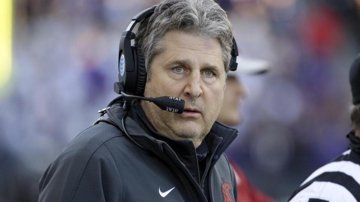 Washington State coach Mike Leach stands on the sidelines in Seattle in 2015.