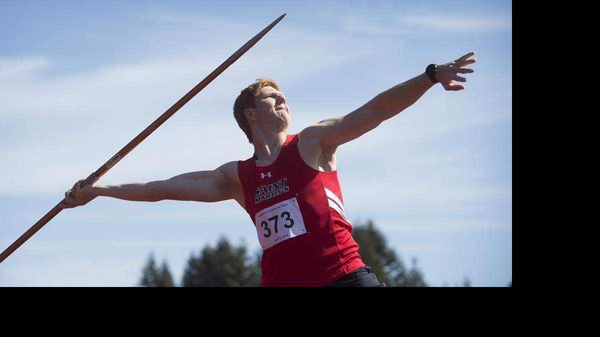 Saint Martin's Andrew Kier throws the javelin during the Saint Martin's University Open track and field meet in Lacey on Saturday, April 2, 2016.