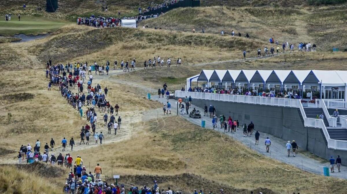 Crowds descended on the former sand mine turned golf course on the first day of the tournament at the 115th U.S. Open at Chambers Bay, Thursday, June 18, 2015.