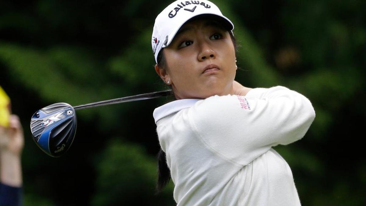 Lydia Ko watches a tee shot Saturday at Sahalee. After a 1-under 70, Ko holds a one-stroke lead heading into the final round at the KPMG Women’s PGA Championship.