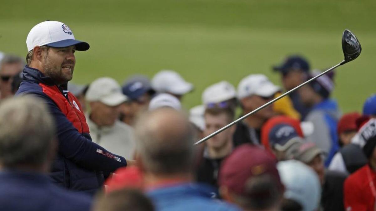 Puyallup’s Ryan Moore watches a shot on the sixth hole during a practice round for the Ryder Cup on Tuesday at Hazeltine in Chaska, Minn.