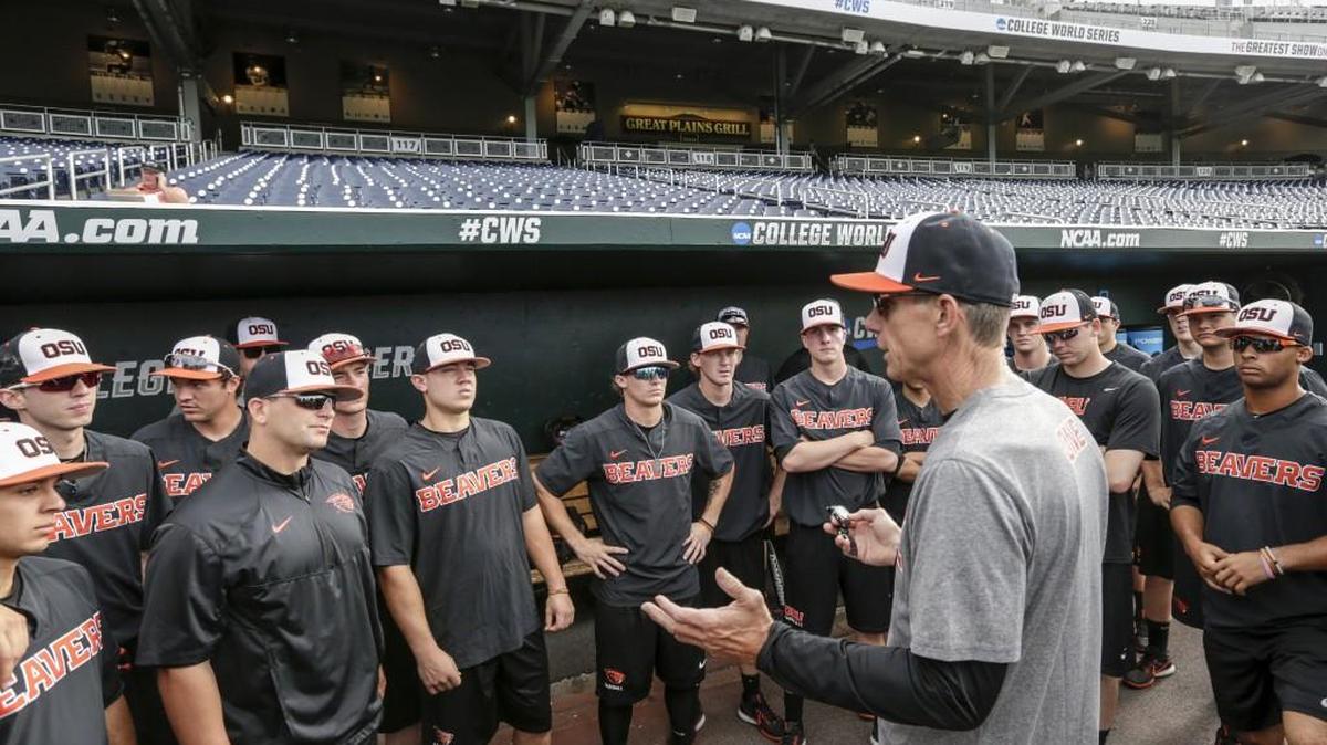 Oregon State coach Pat Casey addresses his players in the dugout before team practice in Omaha, Neb., on Friday. At 54-4, the Beavers enter the College World Series with the fewest losses of any team since 1982.