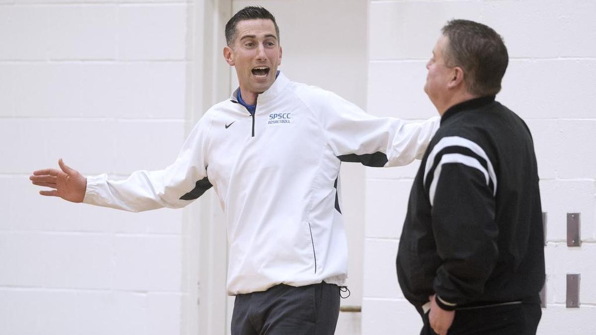 South Puget Sound men’s basketball coach Aaron Landon talks with a game official before Wednesday night’s men’s basketball game against Grays Harbor at South Puget Sound Community College in Olympia on Feb. 22, 2017.