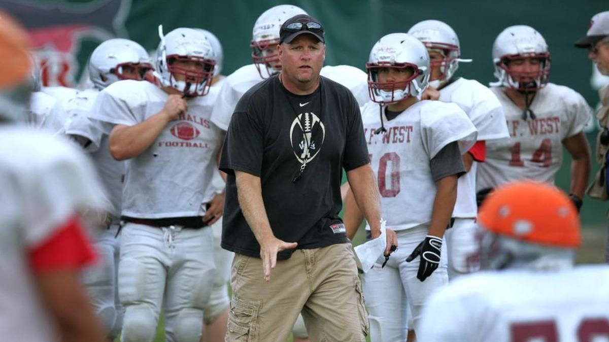 Chehalis head coach Bob Wollan directs the Bearcats during football practice at W.F. West High School in Chehalis on Wednesday, Aug. 24, 2011.