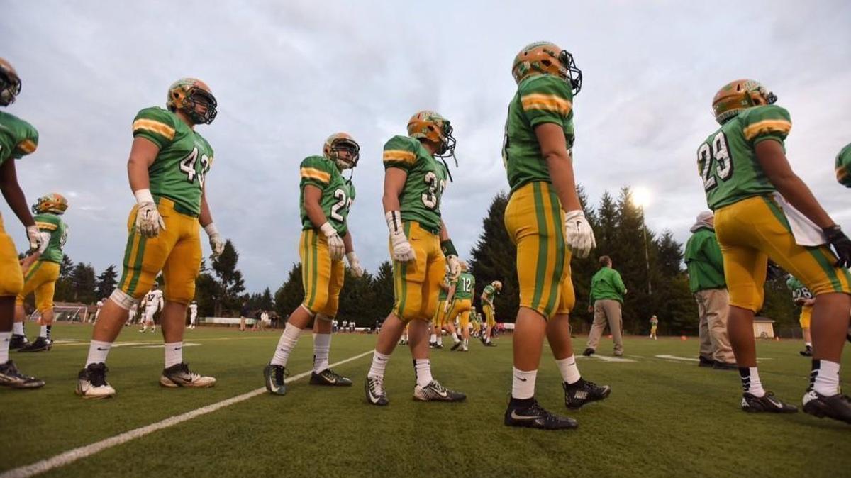 Tumwater T-Bird players warm up before Friday night's Pioneer Bowl matchup with the crosstown rival Black Hills Wolves in a battle of undefeated Top 10 ranked opponents.