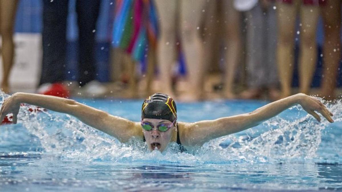 Shelvy Swett of Capital swims the 100 yard butterfly at the Narrows League girls swim championships at Mount Tahoma High School, October 23, 2015.