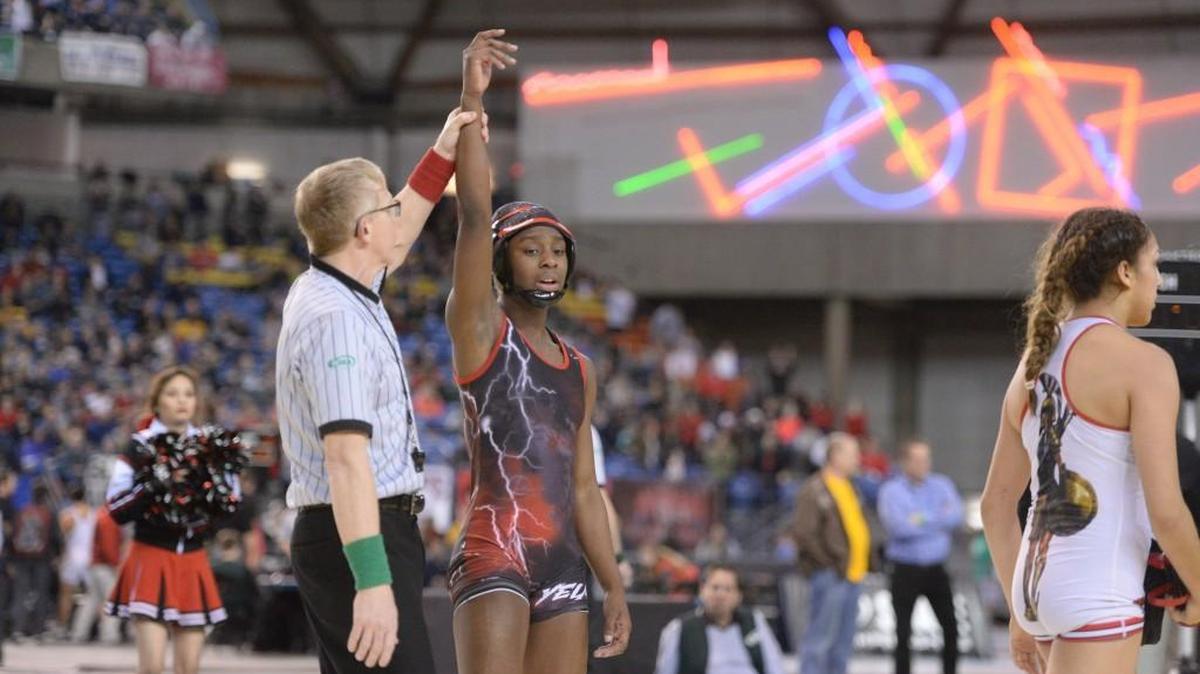 Phoenix Dubose wins the championship round of the 115-pound girls weight class at Mat Classic XXX, held in the Tacoma Dome, Feb. 17, 2018.