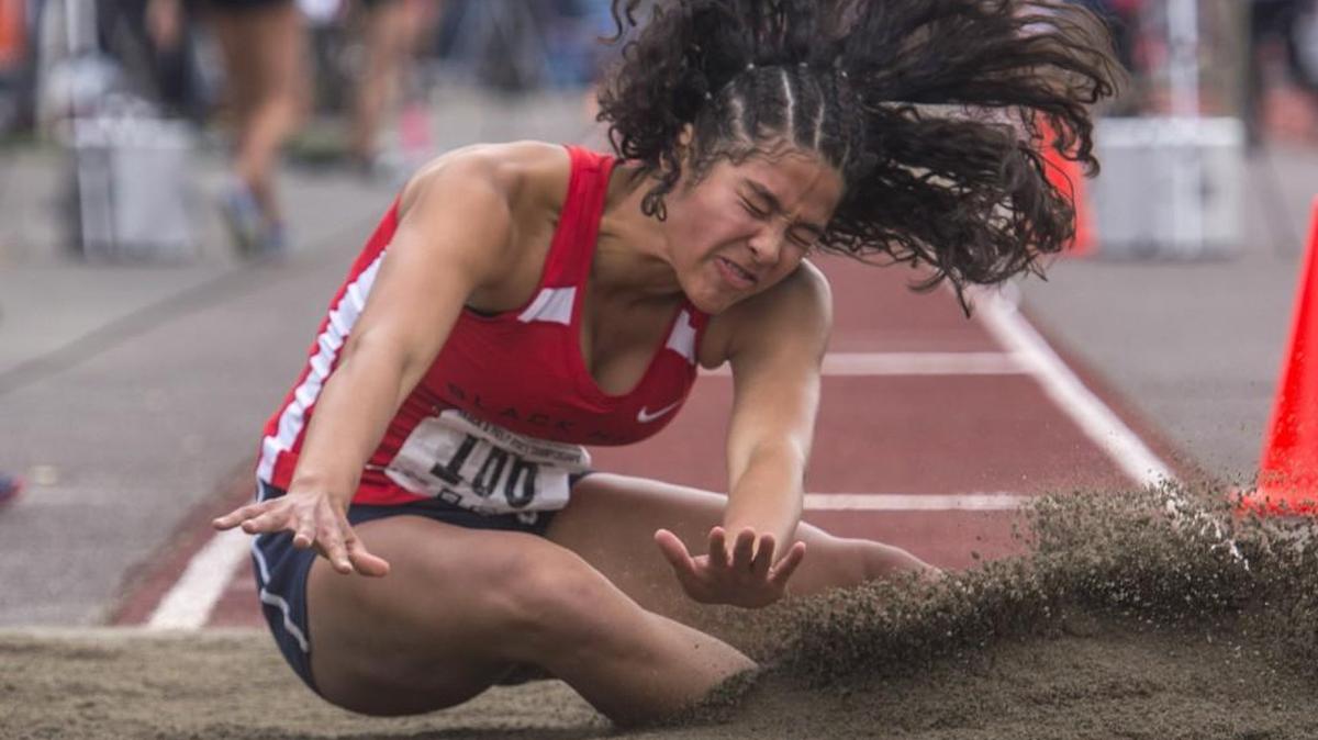 Maisy Williams of Black Hills in the long jump at the state 2A, 3A, and 4A track and field championships meet at Mt. Tahoma High School, May 26, 2018.