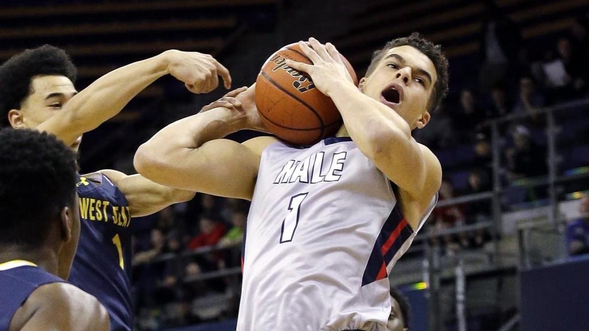 Nathan Hale High School’s Michael Porter Jr. (1) is averaging 37 points and 13 rebounds per game, but pressure is squarely on his team to complete an undefeated season with a 3A state title.