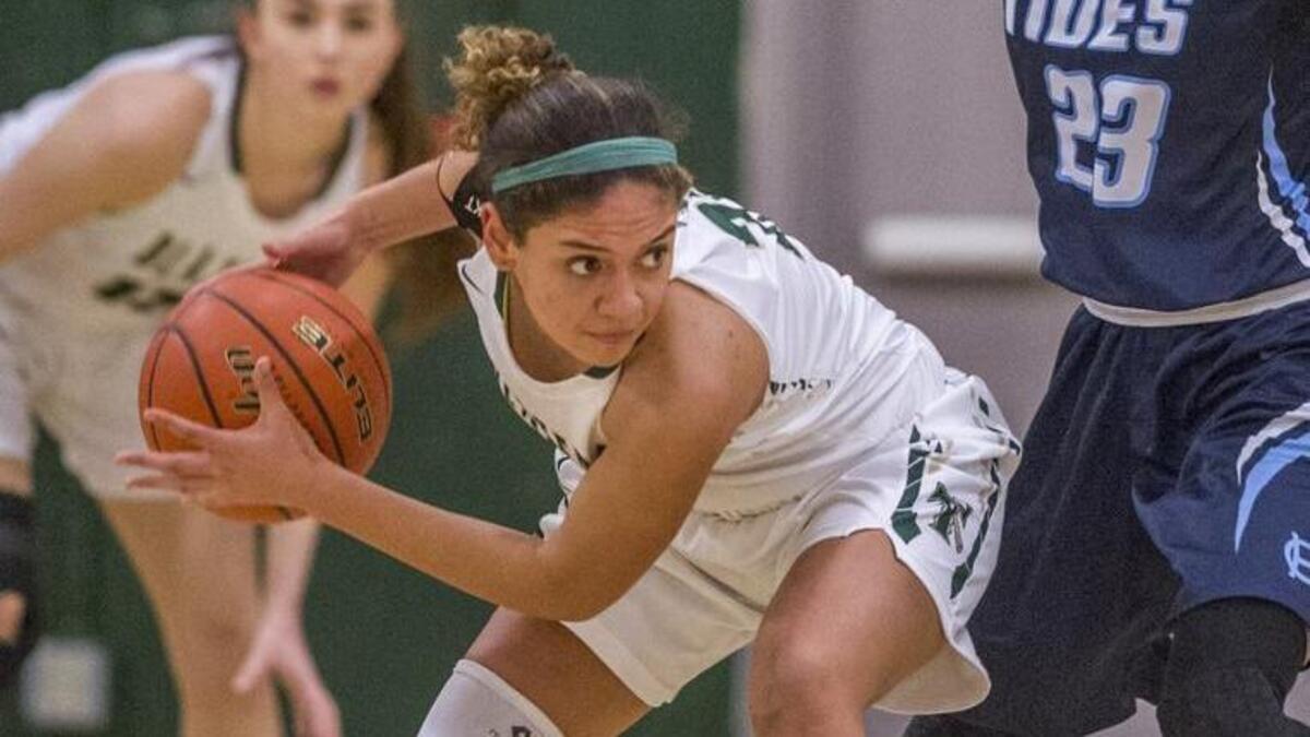 Timberline’s Kiara Brooks is guarded by Sydney Langworthy of Gig Harbor in a girls basketball game at Timberline High School on Jan. 26, 2018
