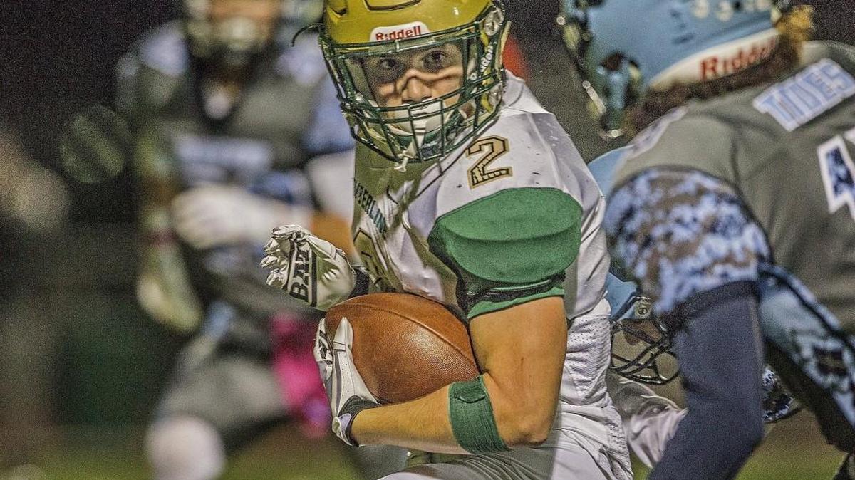 Timberline's Michael Barnes (2) runs for a first down to set up the Blazers' second touchdown against Gig Harbor in a football game at Roy Anderson Field in Purdy, Wash. on Friday, Oct. 13, 2017.