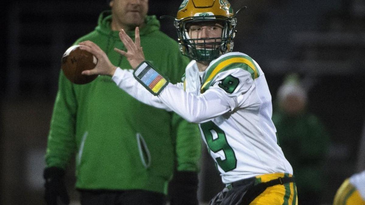 Tumwater quarterback Elias Polito (19) warms up before the game. Steilacoom player Tumwater in a 2A state quarterfinals football game at Harry Lang Stadium in Lakewood, Wash., on Friday, Nov. 17, 2017.