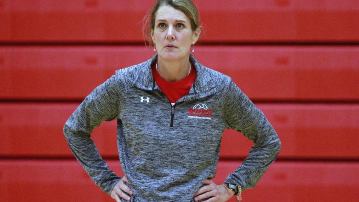 Saint Martin's head coach Kara Peterson watches action during volleyball practice at Saint Martin's University in Lacey on Tuesday, Sept. 30, 2014.