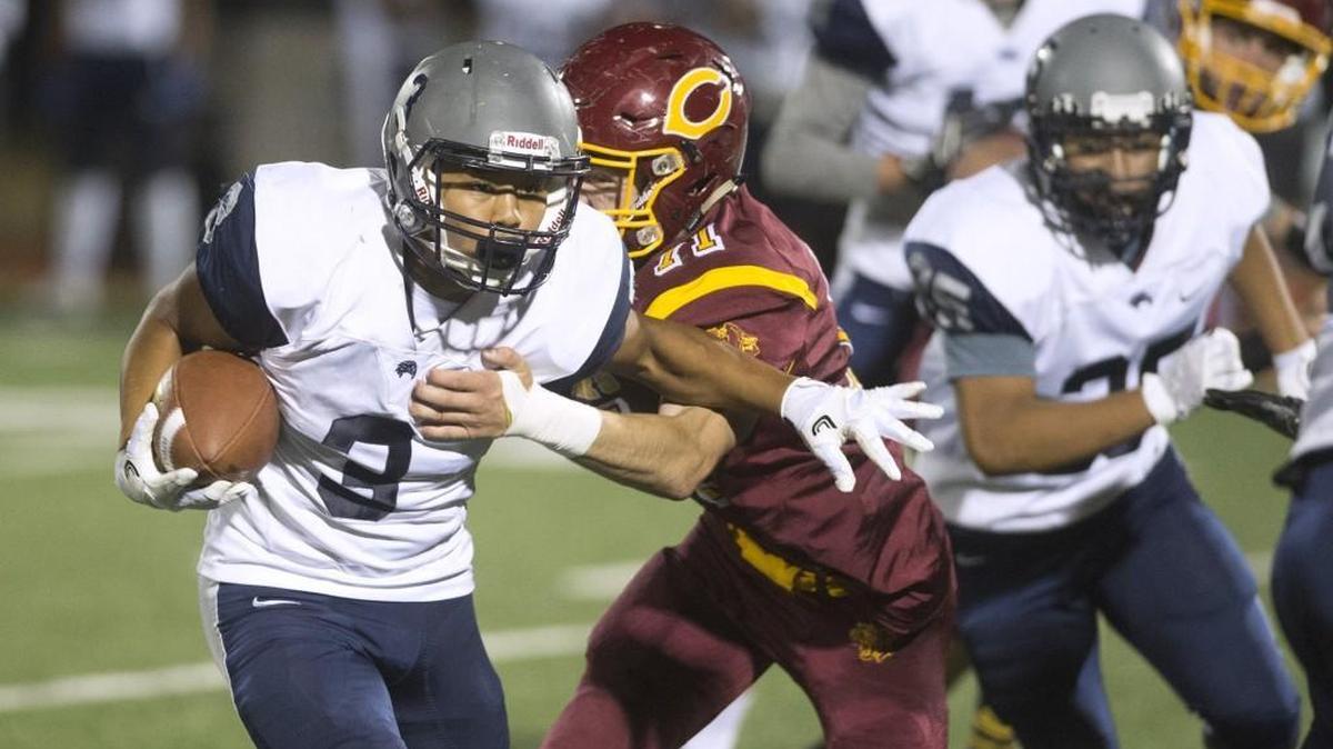 River Ridge junior running back Meleko Mina during the season-opening football game against Capital at South Sound Stadium in Lacey on Friday, Sept. 2, 2016.