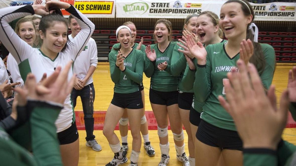 Tumwater celebrates following its come-from-behind, five-set victory over the Archbishop Murphy Wildcats in the fifth-place match at the Class 2A state volleyball tournament last season. The T-Birds loss an early-round match to eventual champion Burlington-Edison.
