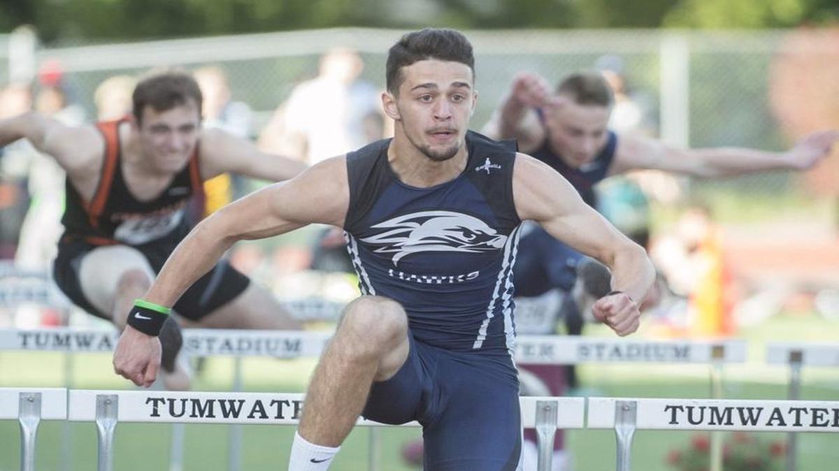 River Ridge’s Josh Braverman runs to a meet-record 14.09 seconds in the boys 110-meter high hurdles at the Shaner Invitational track and field meet at Tumwater District Stadium on Friday, May 5, 2017.
