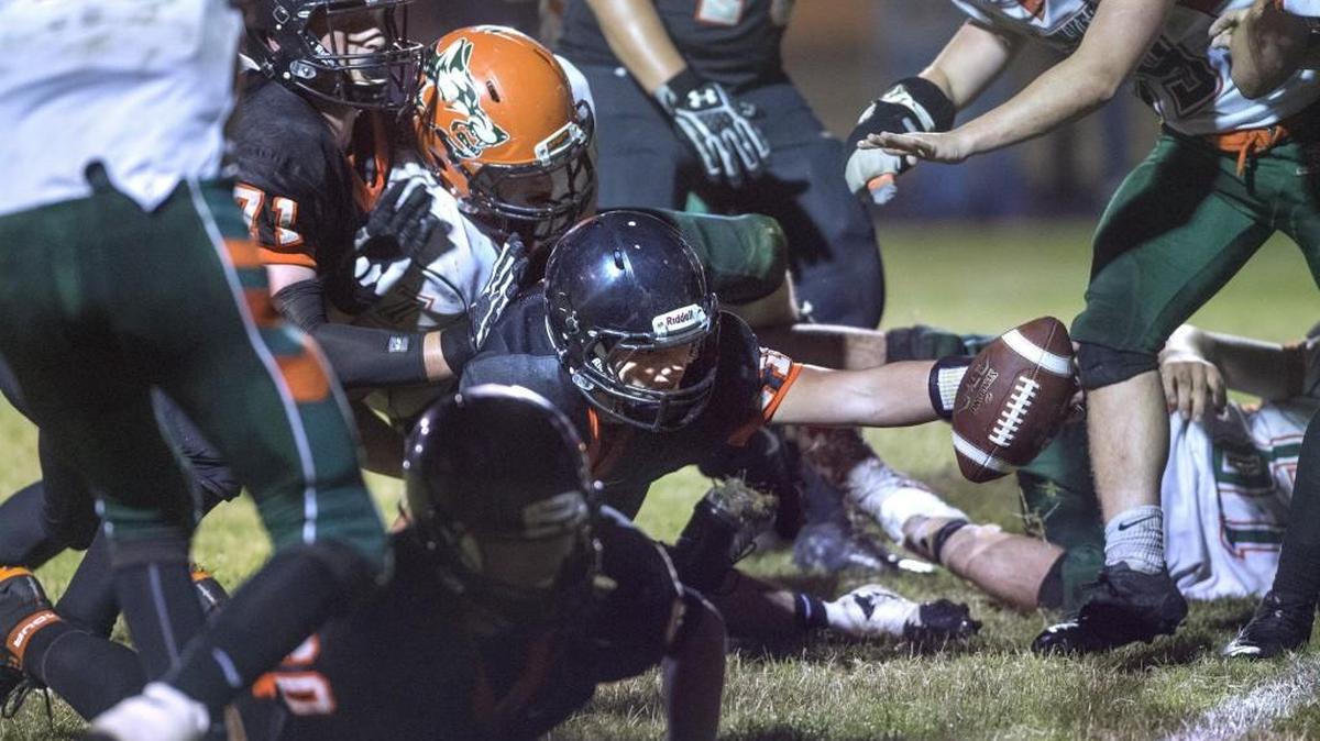 Rainier quarterback Zach Lofgren stretches but comes up short of the goal line on a two-point conversion attempt in the final minutes of Friday night’s football game against Morton-White Pass at Rainier High School. The failed conversion maintained Morton-White Pass’ 34-33 lead.