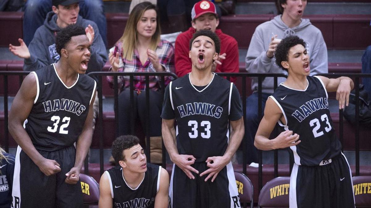 River Ridge players, from left, Kelle Sanders, Trey'vonne Dorfner, Issiah Scott and Kolton Knox celebrate a 3-point shot as the Hawks run out to a 40-point lead against White River. River Ridge is undefeated in 2A SPSL play at 10-0 and are 14-1 on the season.