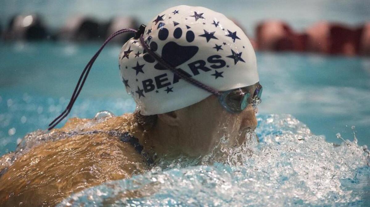 Olympia’s Emma Song competes in the second leg of the 200-yard medley relay at the 4A Girls State Swim and Dive Championships at the King County Aquatics Center in Federal Way, Wash., on Friday, Nov. 10, 2017.