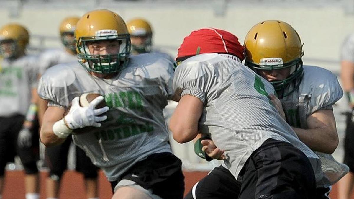
Accounting for more than 1,800 all-purpose yards last season, Tumwater’s Easton Trakel runs the football during a morning practice Saturday.

