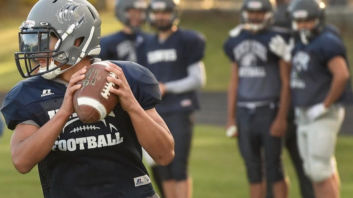 River Ridge QB Tomasi Manu has morphed into a multi-purpose player for the Hawks this season after playing JV a year ago. His versatility has allowed coach Steve Schultz to move him around on offense and defense.