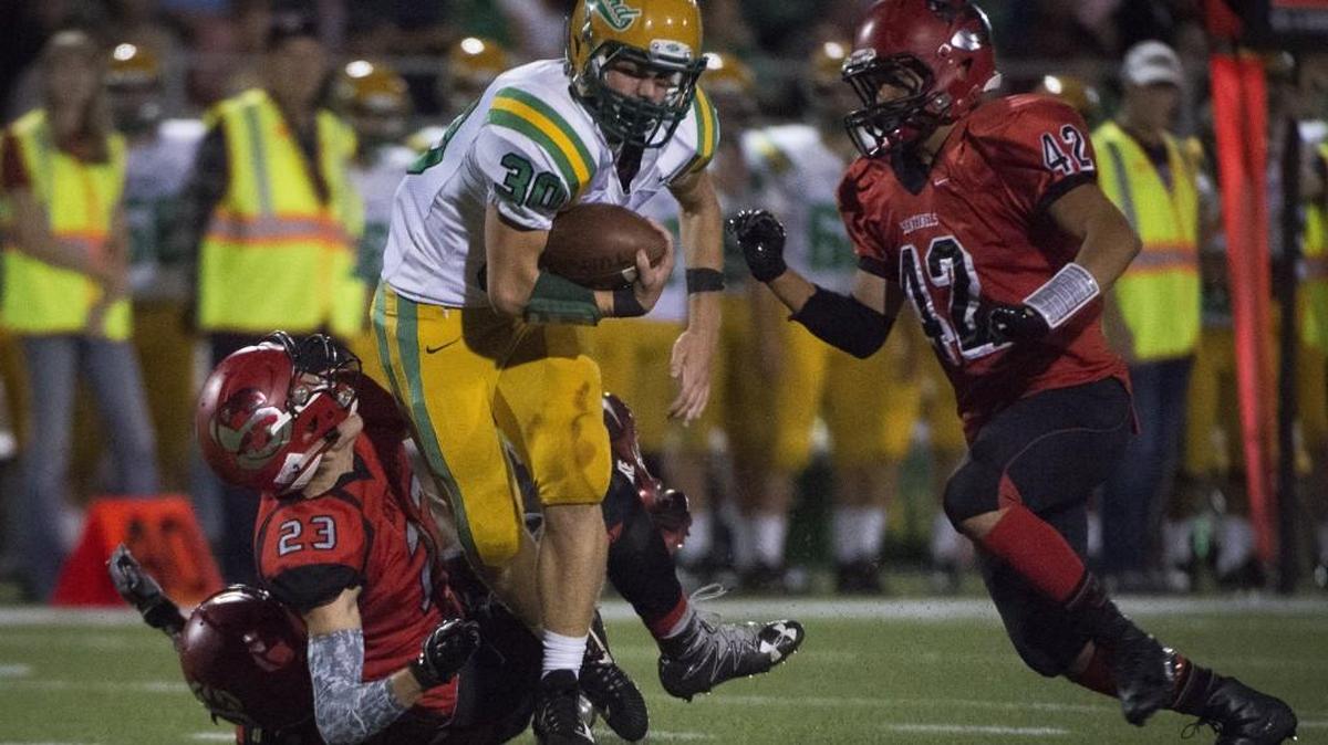 Tumwater's Dylan Paine (30) fights for extra yards in the second quarter. Steilacoom played Tumwater in a football game at Steilacoom High School in Tacoma, Wash., on Thursday, Sept. 28, 2017.