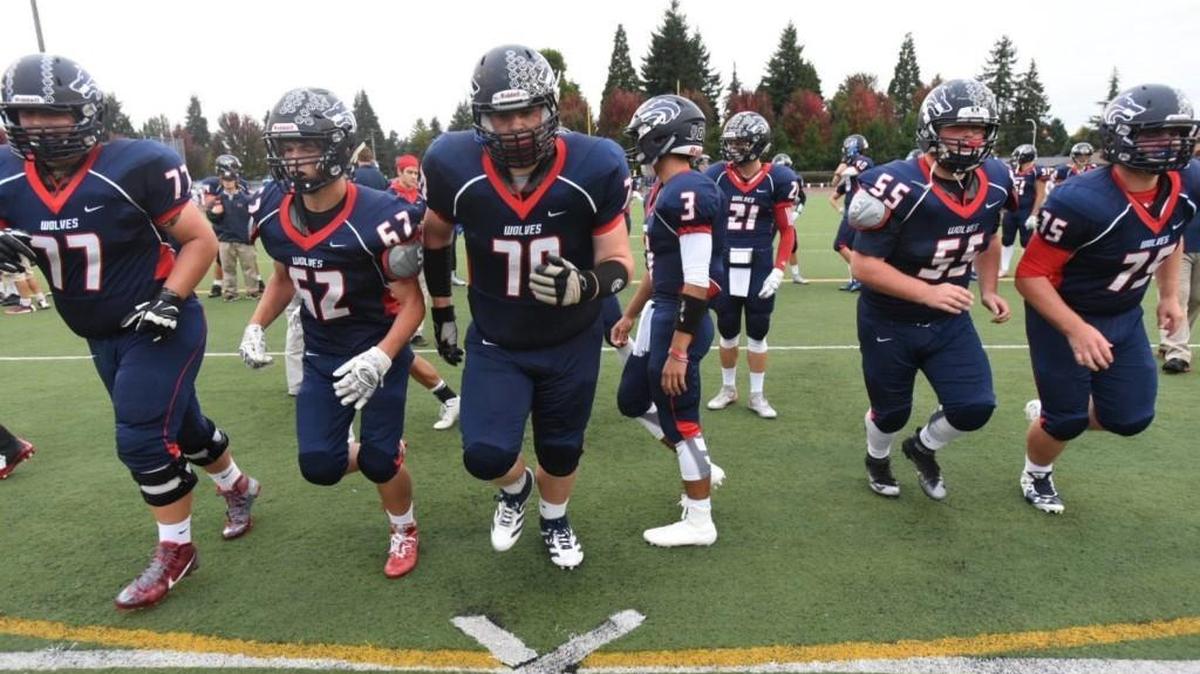 
Black Hills players run through plays at Tumwater District Stadium before their football game against Columbia River on Friday, Sept. 25, 2015.
