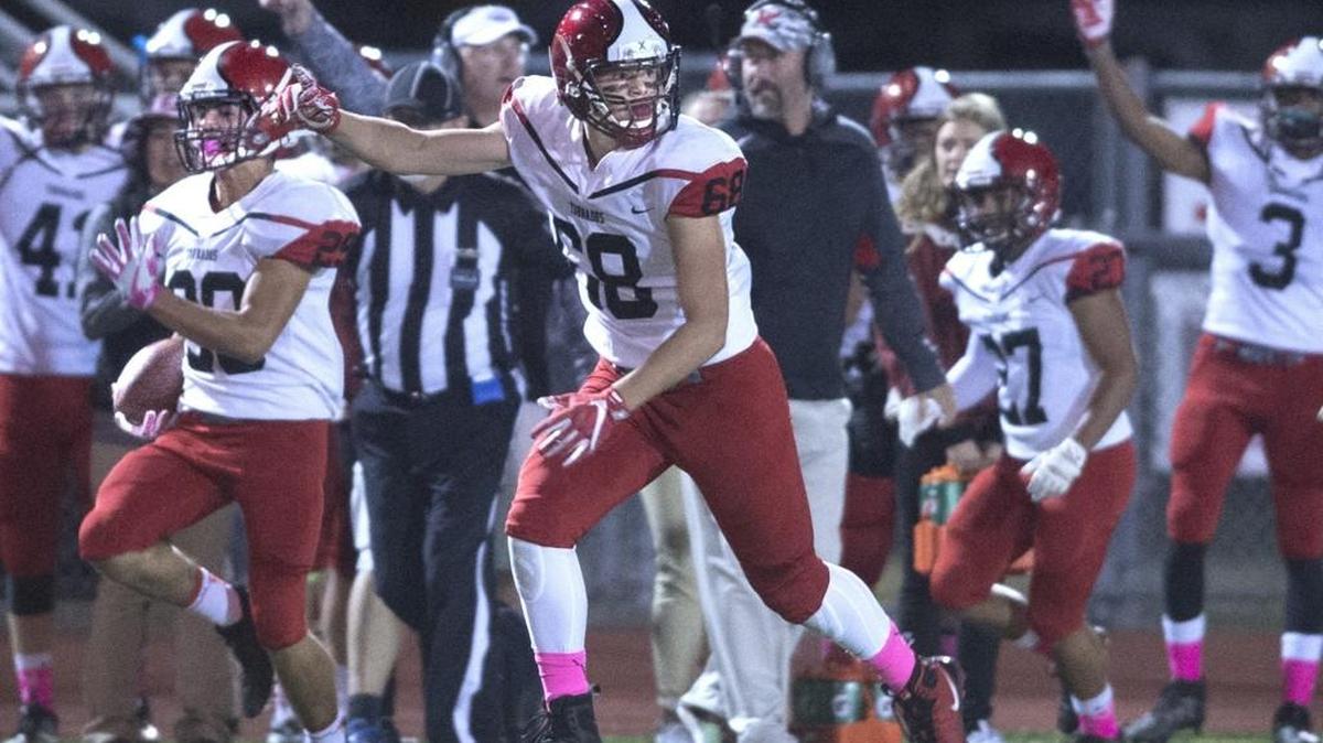 Yelm sophomores Carson Amendt (left) and Bradley McGannon speed down the field on Amednt's kickoff for a touchdown during a football game against Timberline at South Sound Stadium in Lacey on Oct. 6, 2017.