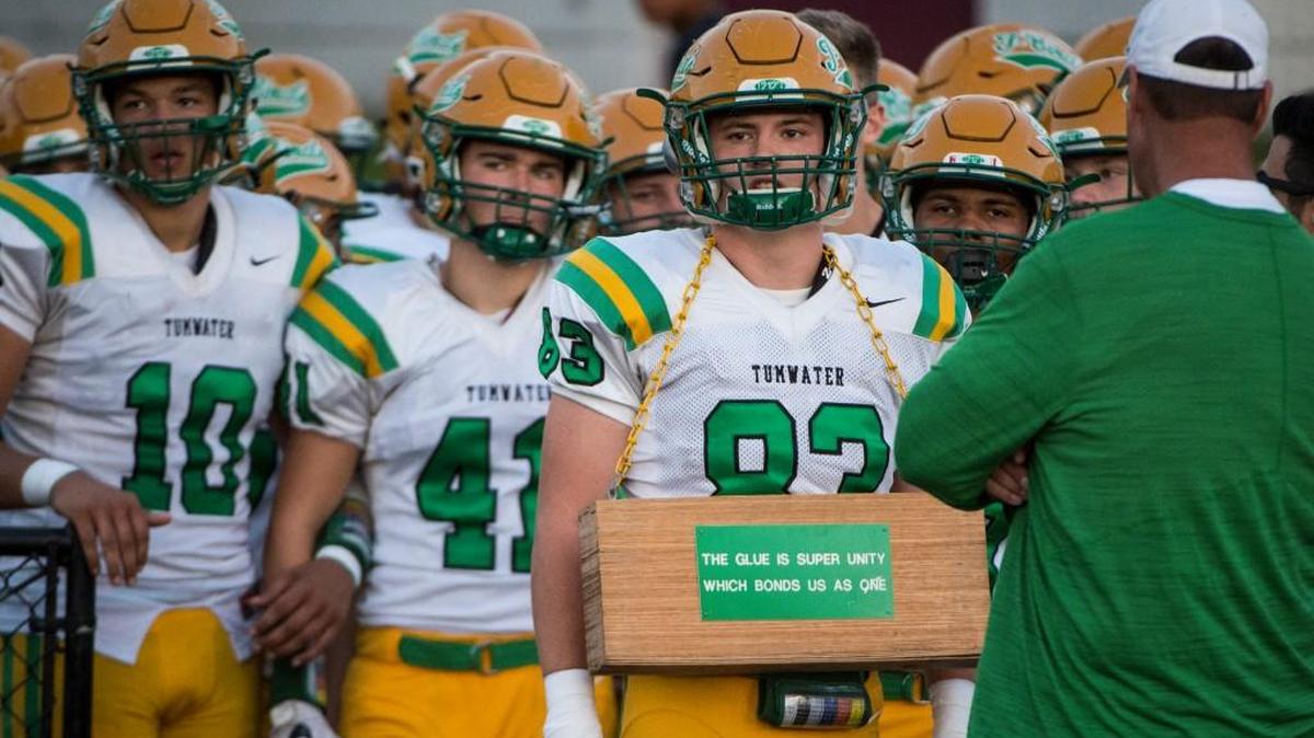 Defensive lineman Aiden Slater stands in front of a pack of T-Birds before Tumwater’s game against Steilacoom at Steilacoom High School in Tacoma, Wash., on Thursday, Sept. 28, 2017.