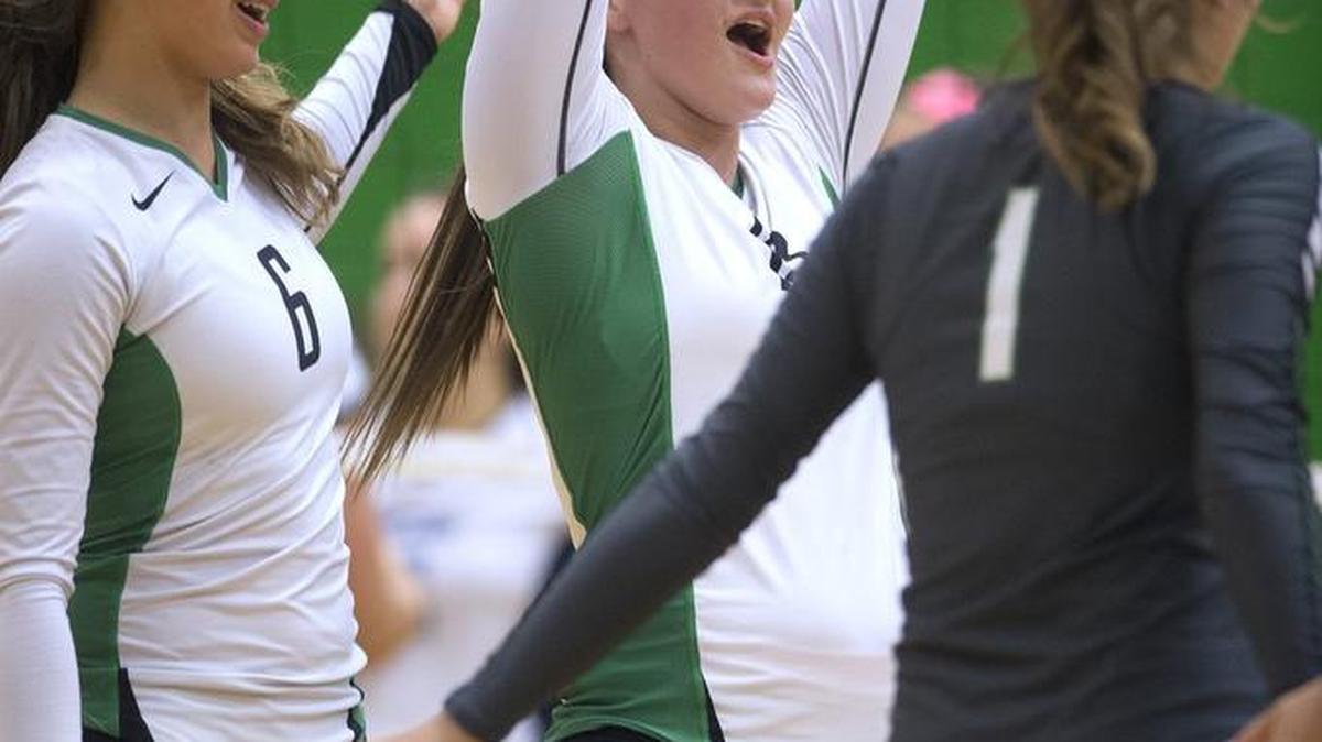 Tumwater’s Bella Najarro, center, celebrates during Thursday’s match against Olympia. Najarro, who missed much of last season after an appendectomy, had six kills.
