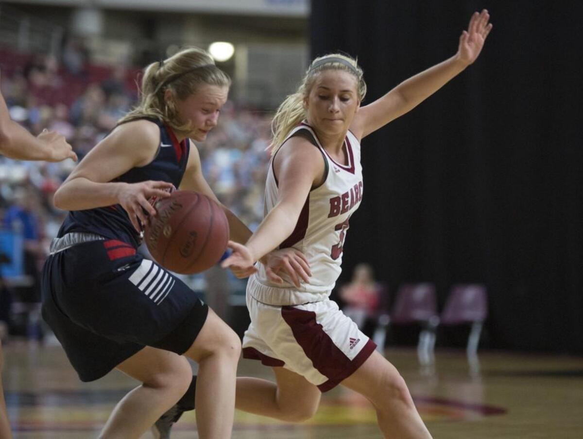 W.F. West's Kiara Steen, right, steals the ball from Black Hills' Megan River during the Class 2A state tournament on Saturday, March 4, 2017, at the Yakima Valley SunDome.