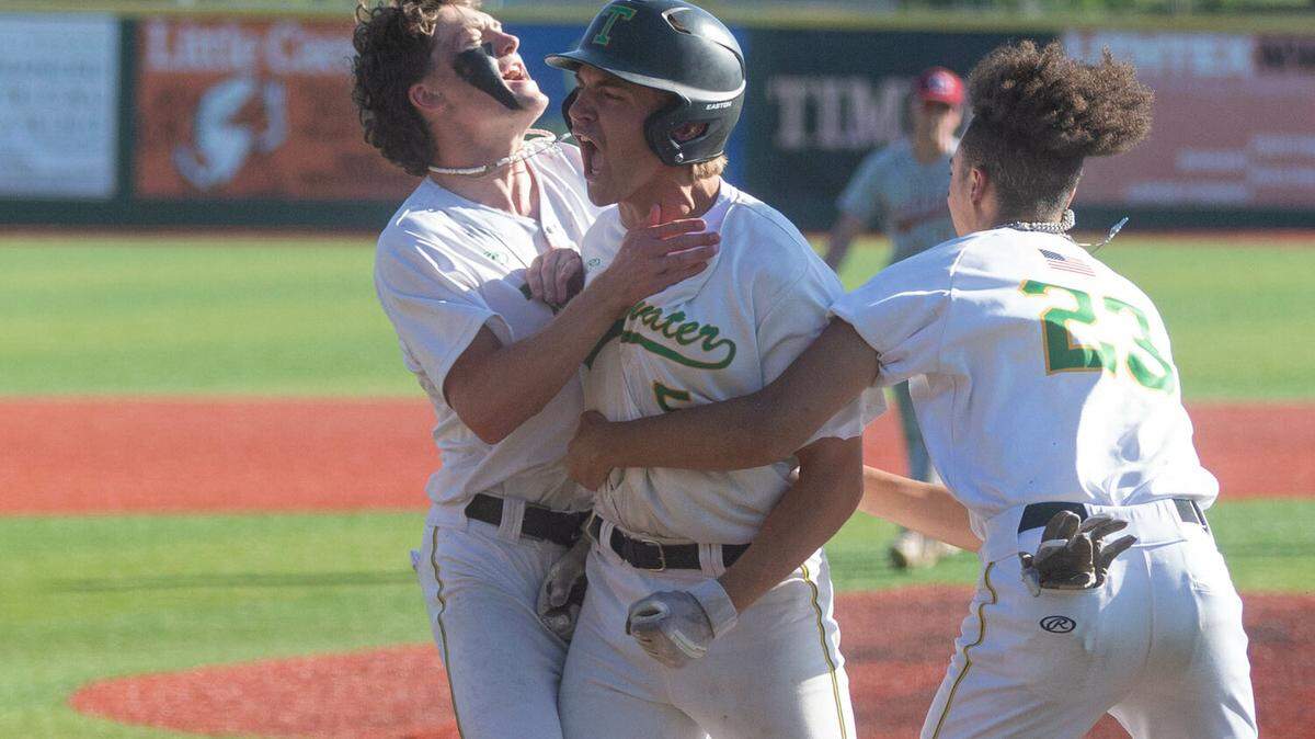 Tumwater’s Kyler Collier celebrates his walk-off sacrifice against W.F. West in the 2A State semifinals at Joe Martin Stadium in Bellingham May 26.