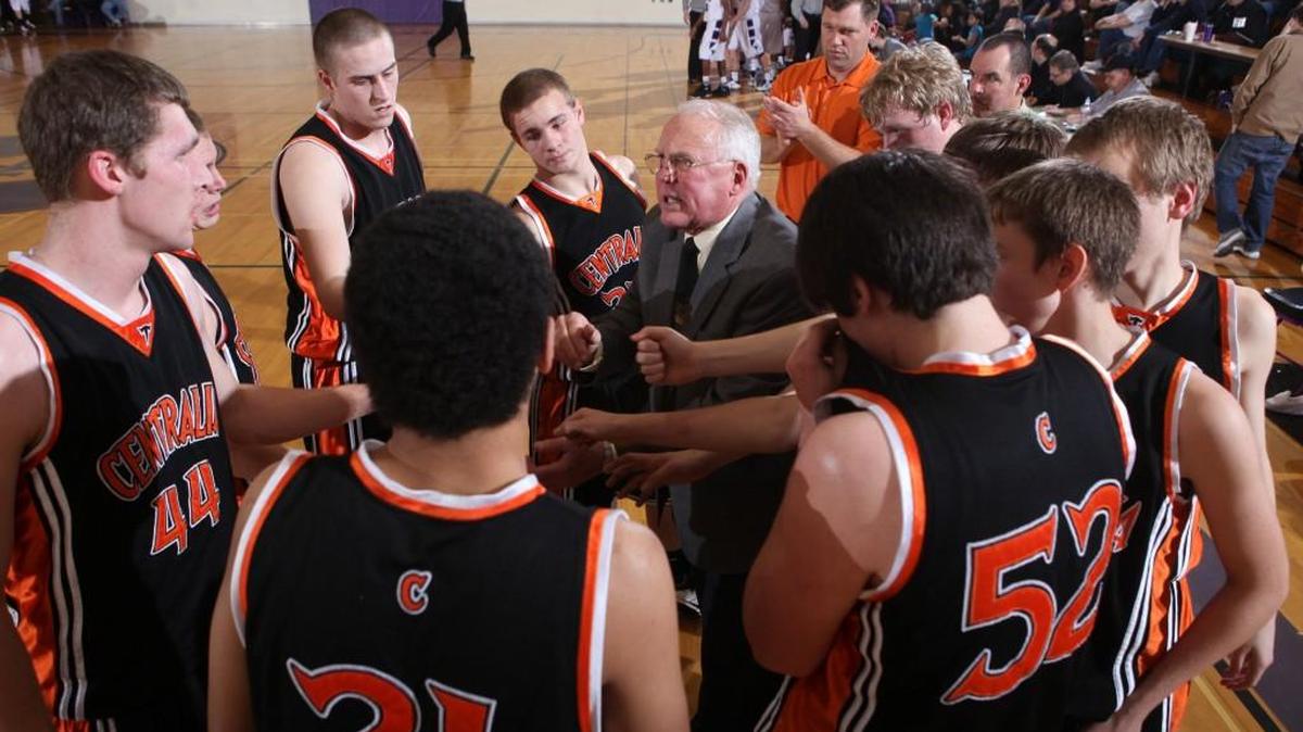 Centralia head coach Ron Brown directs the Tigers during a time out in Tuesday night's boys basketball game at North Thurston High School in Lacey on Jan. 25, 2011.