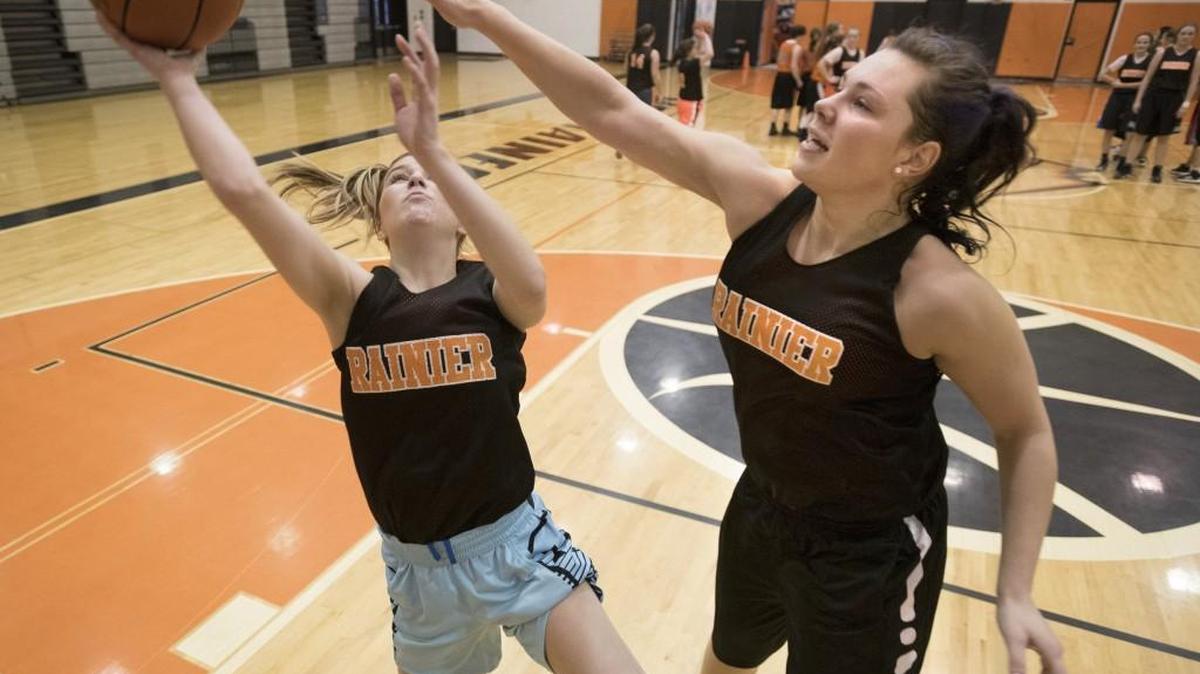 Rainier senior Peyton Dungan (right) and senior guard Kera Anderson were both named to the 2016 2B Pacific all-league girls basketball team. Dungan was named to the first team, Anderson to the second.