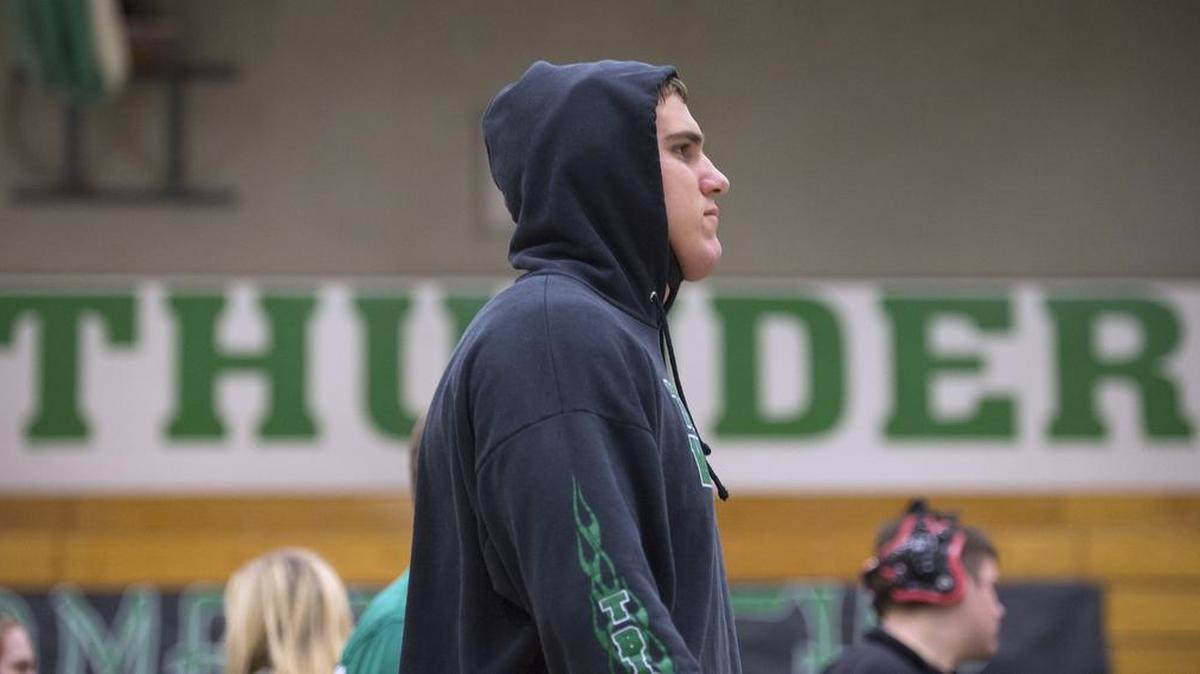 Tumwater’s Cy Hicks prepares for a match during the Pat Alexander Invitational Wrestling Tournament at Tumwater High School last season.