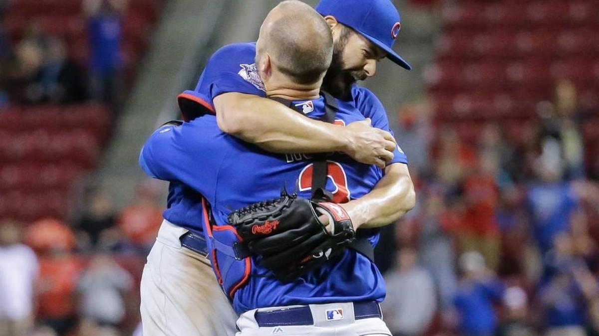 Chicago Cubs starting pitcher Jake Arrieta, left, celebrates with catcher David Ross after the final out of his no-hitter against the Cincinnati Reds on Thursday.