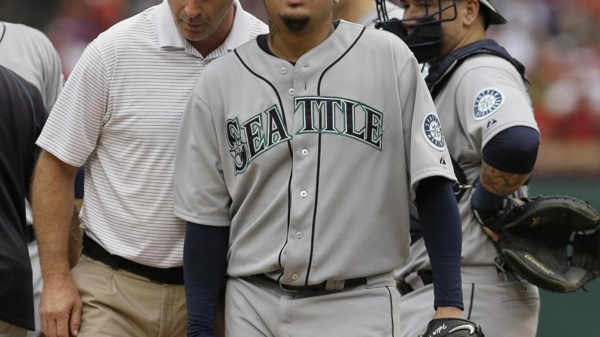 
Seattle Mariners starting pitcher Felix Hernandez comes out of the game after experiencing elbow stiffness in the sixth inning Sunday against the Texas Rangers in Arlington. Hernandez said Tuesday that he expects so make his next regularly scheduled start.
