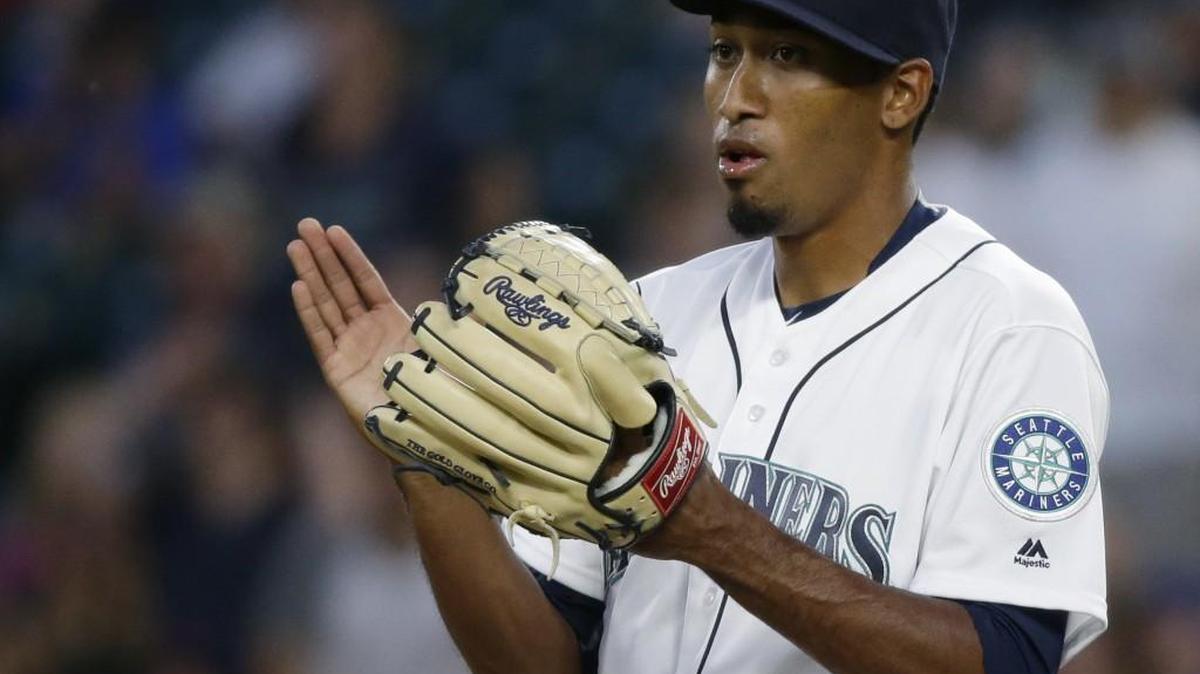 Seattle reliever Edwin Diaz claps his mitt following an out in the seventh inning against Cleveland on June 6 in Seattle.