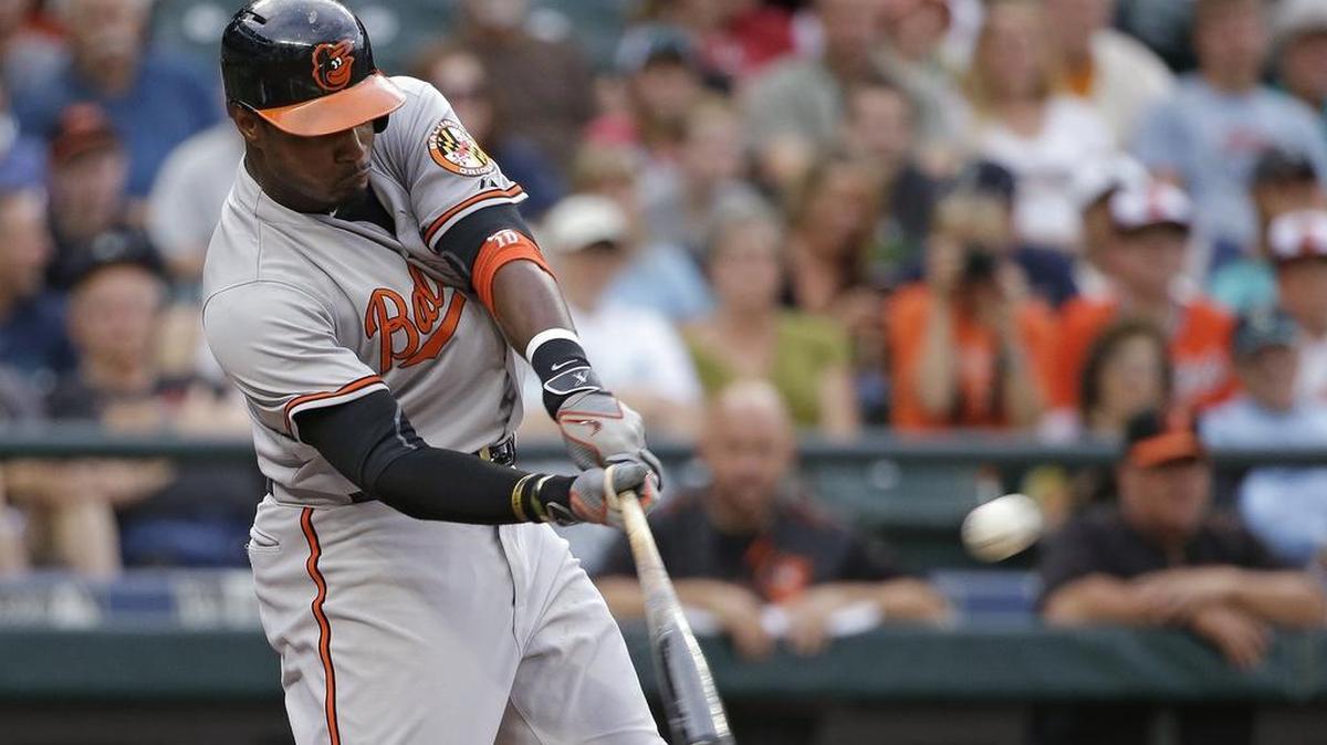 
Adam Jones of the Orioles hits a home run against the Mariners — his former team — in the first inning Monday.

