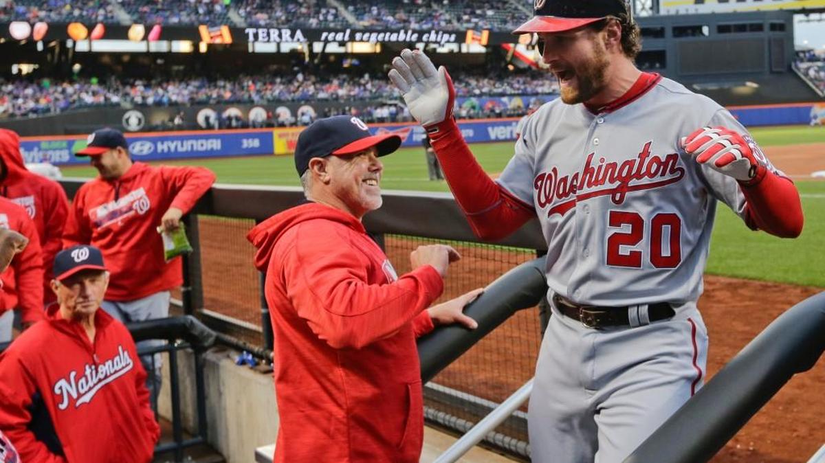 Washington’s Daniel Murphy (20) celebrates with teammates after hitting a two-run home run during the first inning against the New York Mets on Thursday.