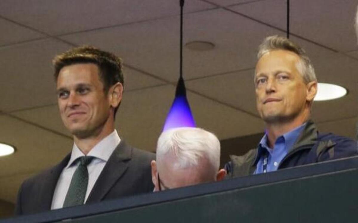 Tom Allison, right, was promoted by the Mariners from director of pro scouting to head of all of the organization’s scouting operations.