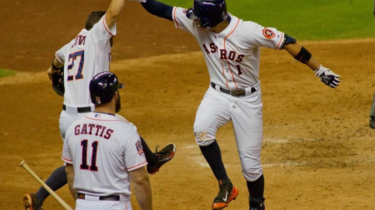 
Carlos Correa, right, celebrates his two-run home run with teammate Jose Altuve as on-deck batter Evan Gattis looks on in the fifth inning against the Seattle Mariners on Monday in Houston.
